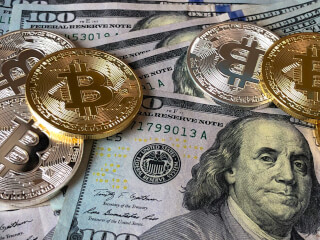 bitcoins-and-u-s-dollar-bills bitcoins-and-u-s-dollar-bills