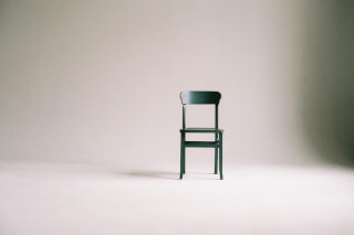 green-wooden-chair-on-white-surface green-wooden-chair-on-white-surface