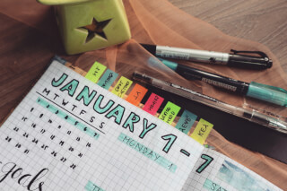 photo-of-planner-and-writing-materials photo-of-planner-and-writing-materials