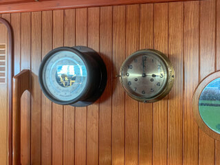 To the right of the instrumentation is a porthole to the shower To the right of the instrumentation is a porthole to the shower