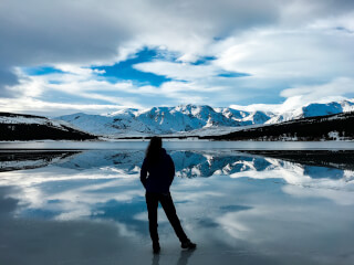 silhouette-photo-of-woman-facing-snow-capped-mountain silhouette-photo-of-woman-facing-snow-capped-mountain