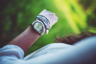 silver-watch-on-the-girl-s-arm-present silver-watch-on-the-girl-s-arm-present